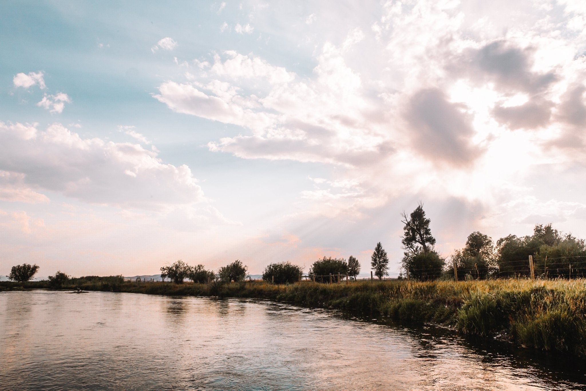 Beaverhead Drift, Montana captures the timeless rhythm of river life in the American West. Jules Frazier fine art photographs