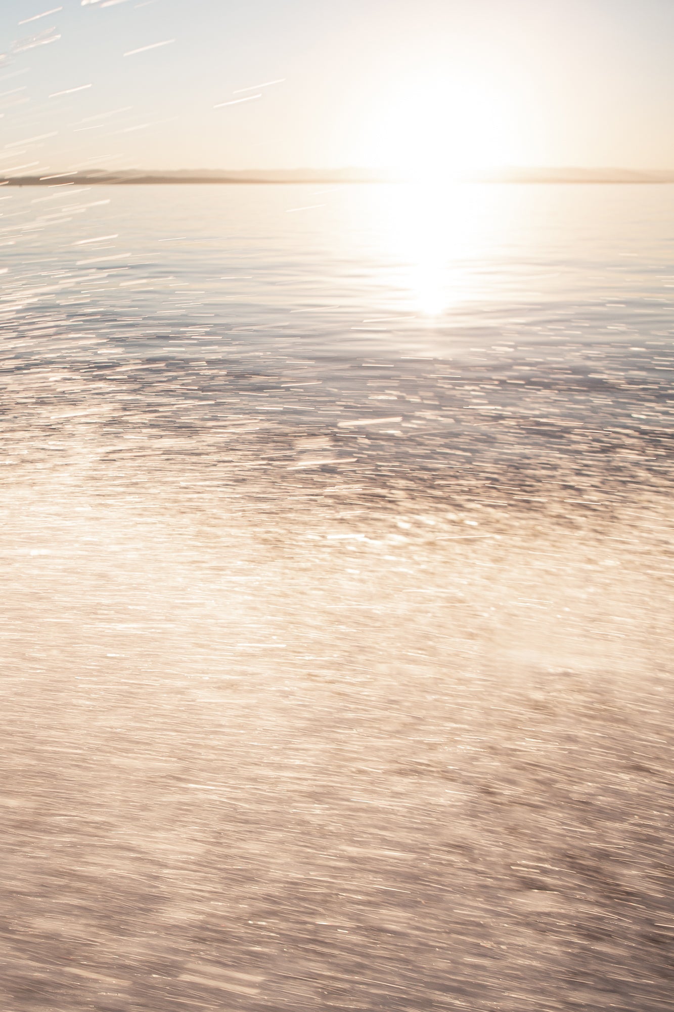 Sunlight reflecting on a water surface with a blurred background-abstract fine art print from Jules Frazier
