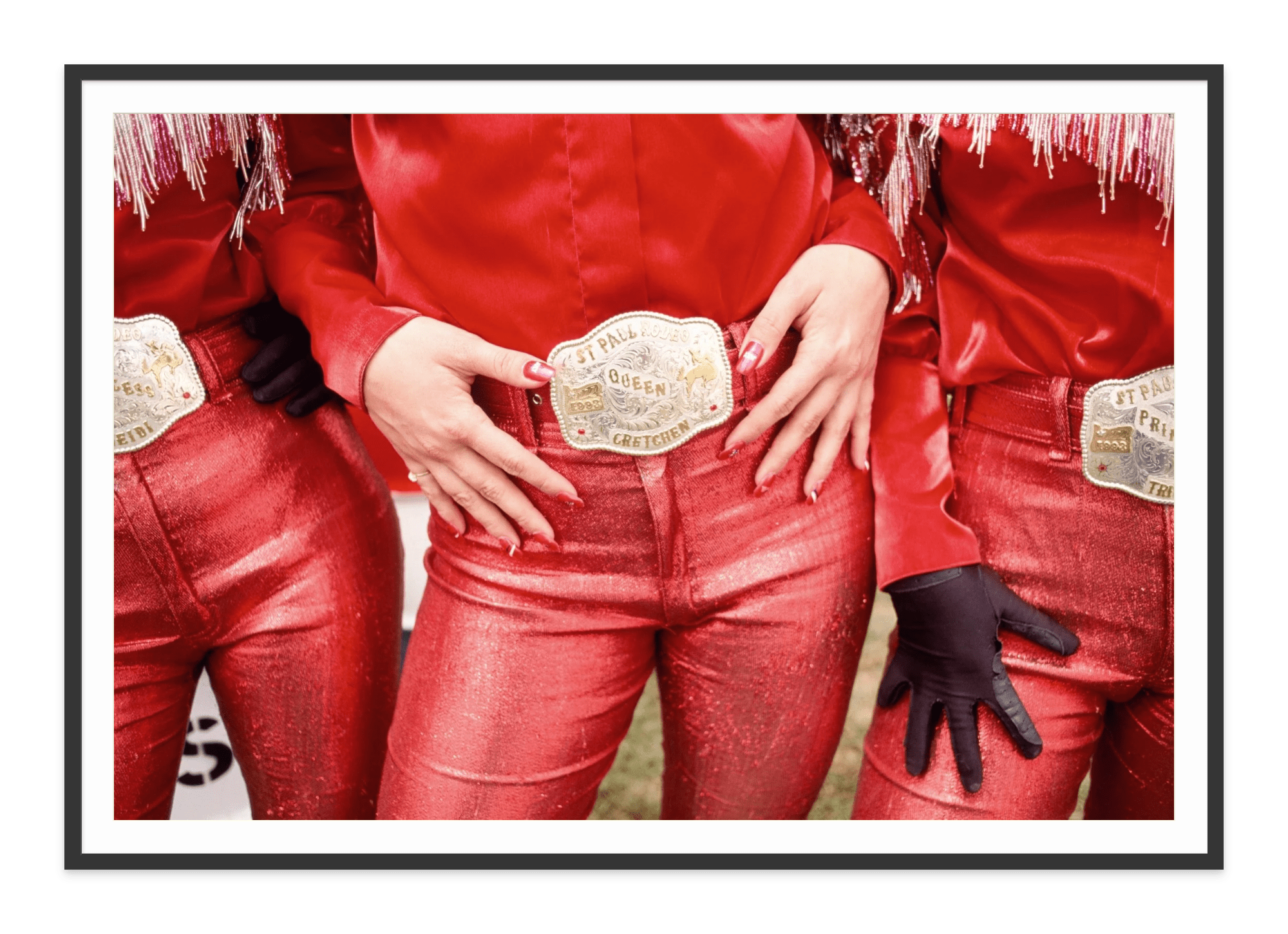 black frame of rodeo queens in red