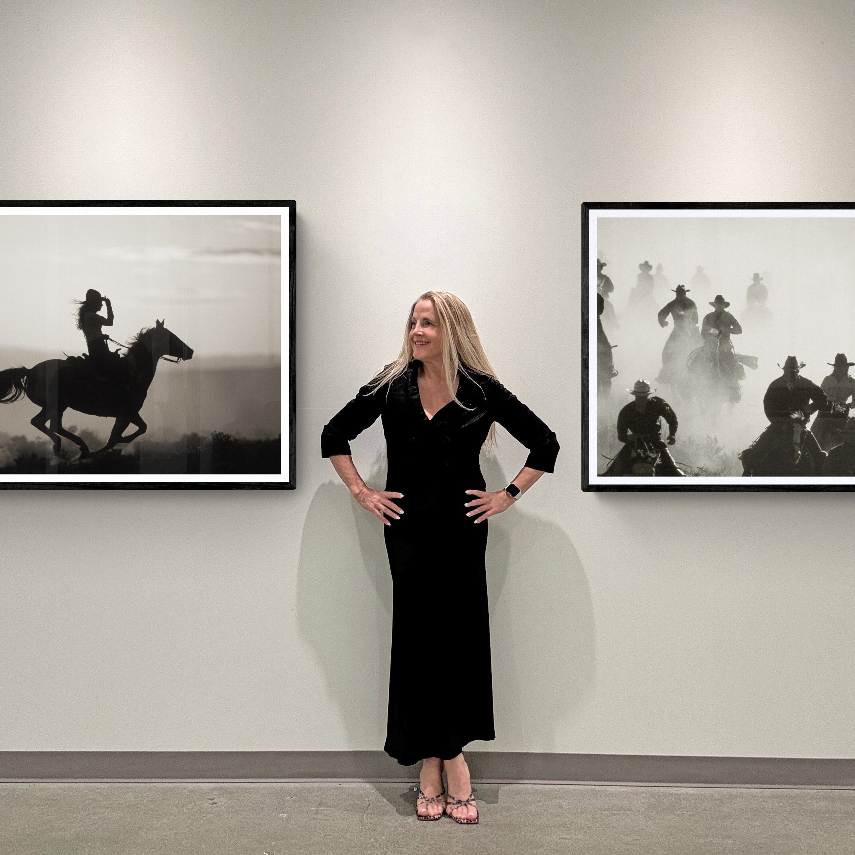 Jules Frazier in gallery with western art