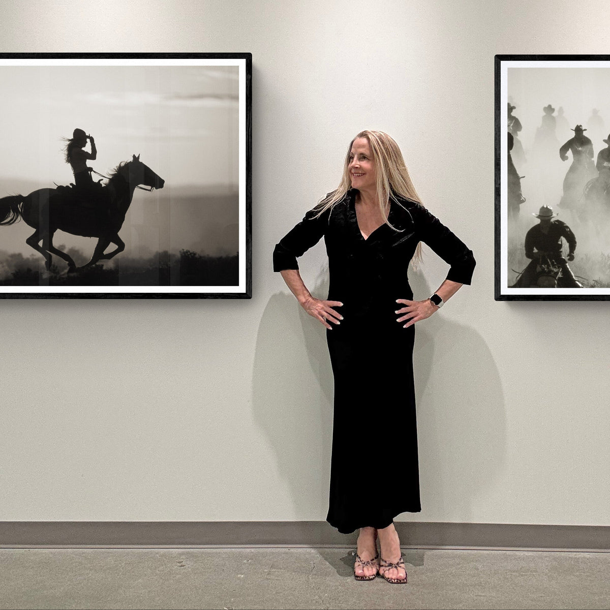 Jules Frazier in gallery with western art