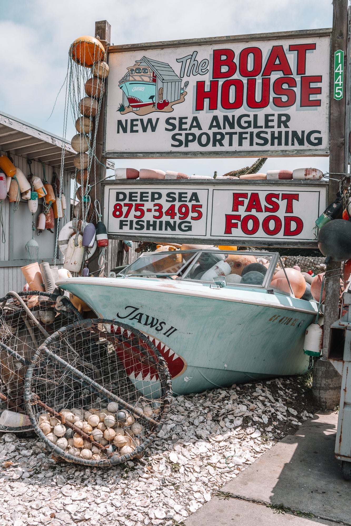 Coastal classic brimming with vintage memorabilia, Boat House, modern fine art print with retro seaside charm.