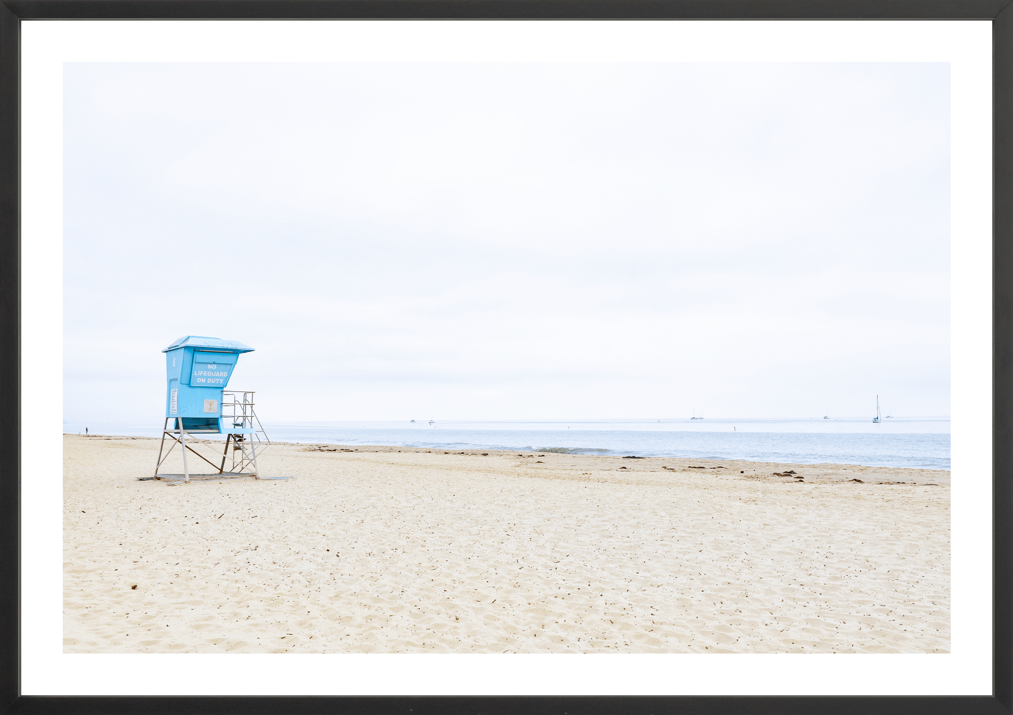 No Lifeguard on Duty by Jules Frazier. A coastal fine art print, minimal, spirit of beach culture. Black frame