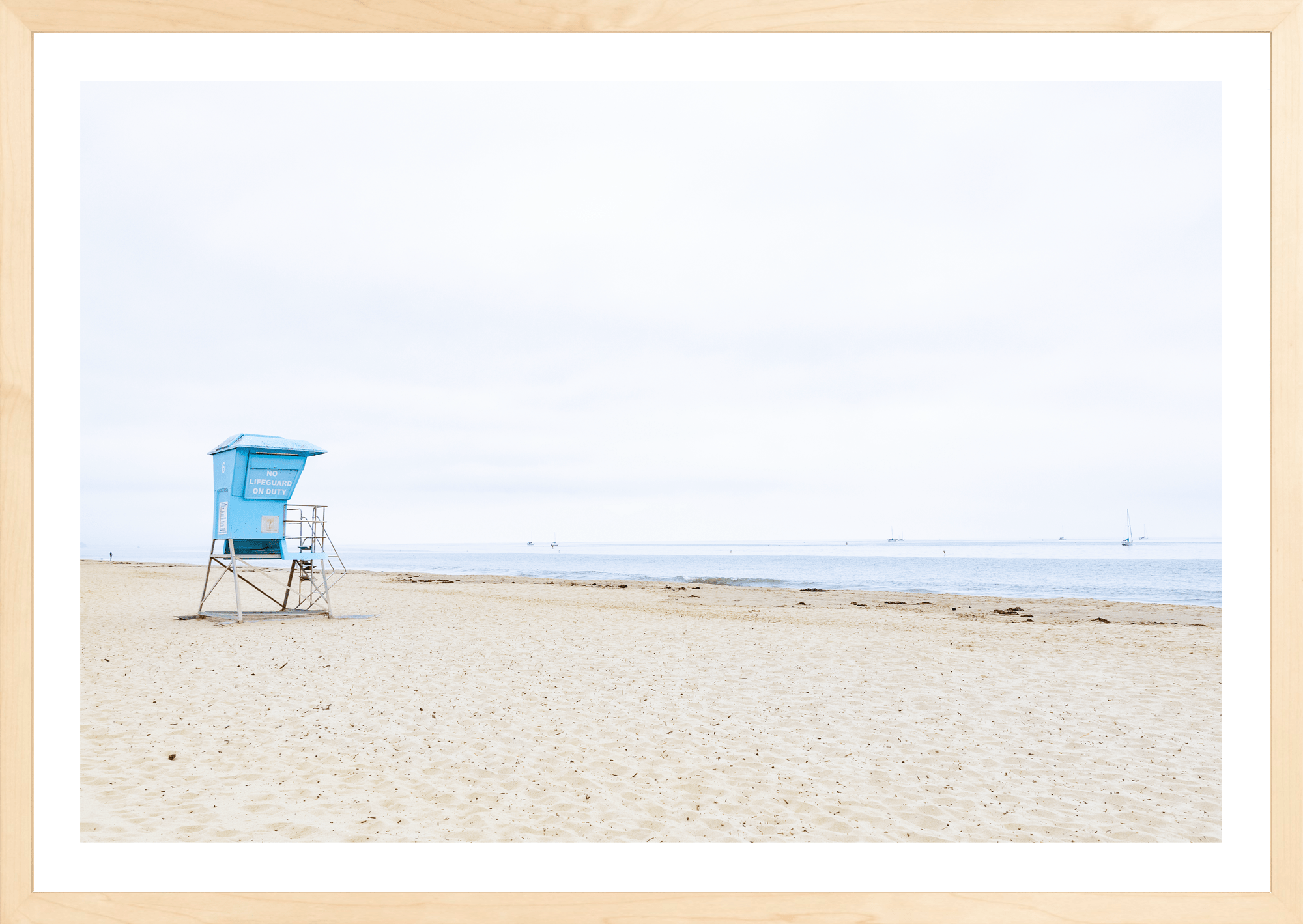 No Lifeguard on Duty by Jules Frazier. A coastal fine art print, minimal, spirit of beach culture. Natural frame.