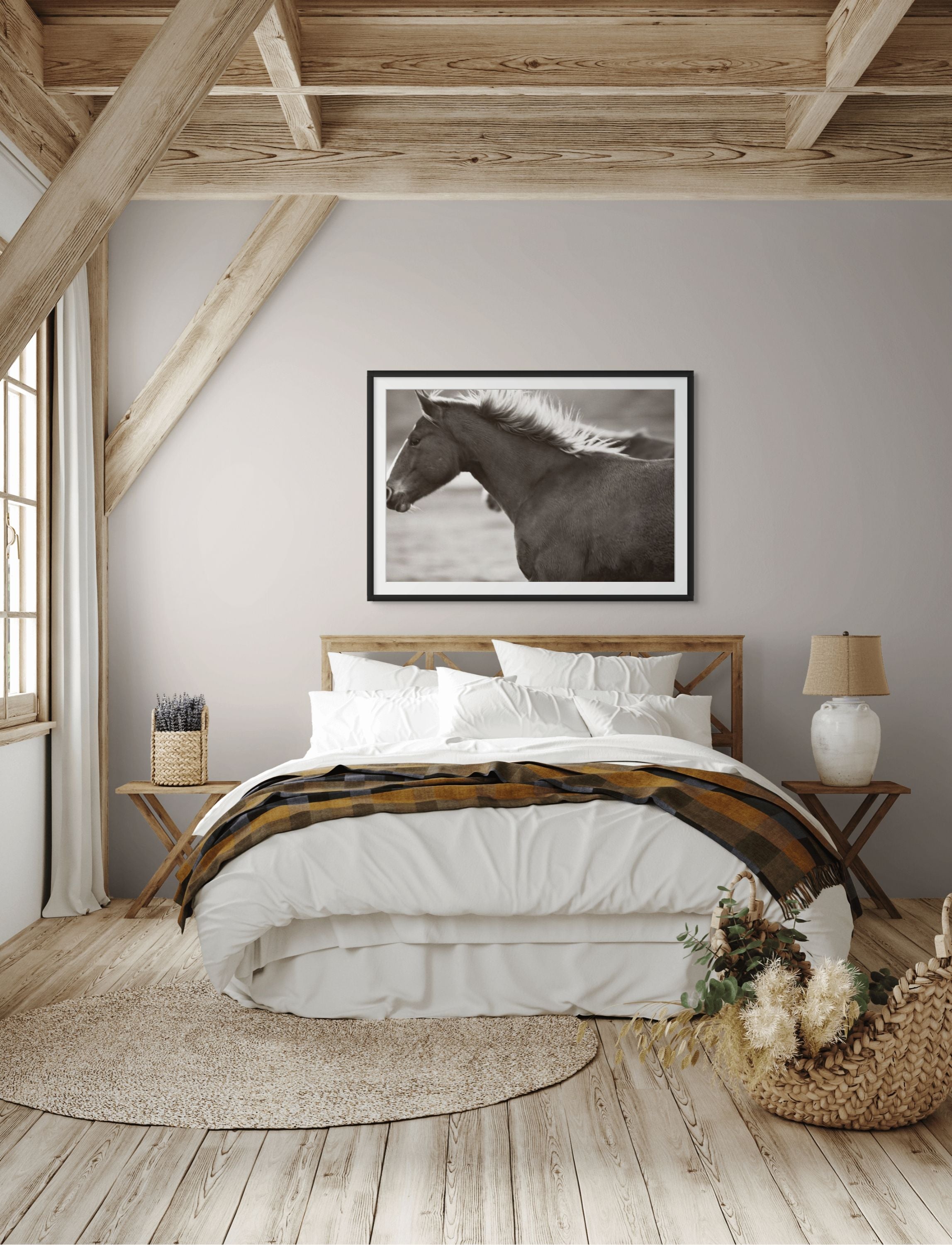 Bedroom with wooden beams, a bed with white bedding, and a horse painting on the wall.