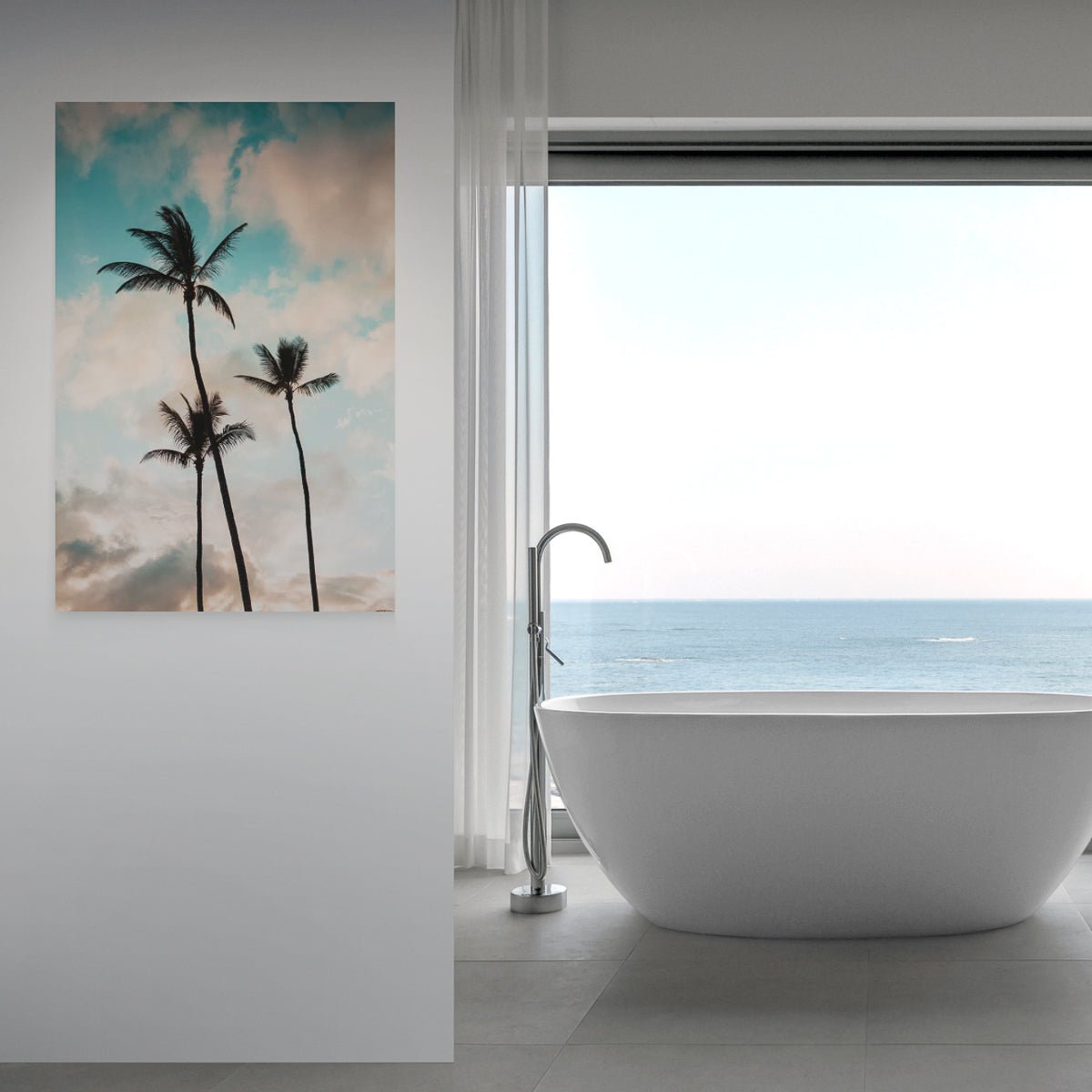 Bliss Palms fine art print on a bathroom wall beside a freestanding tub, by Jules Frazier