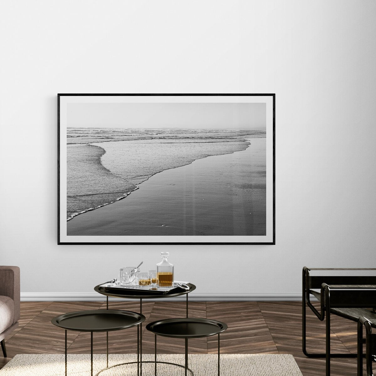 Evening Tide fine art print in a black frame above tables in a living room, by Jules Frazier