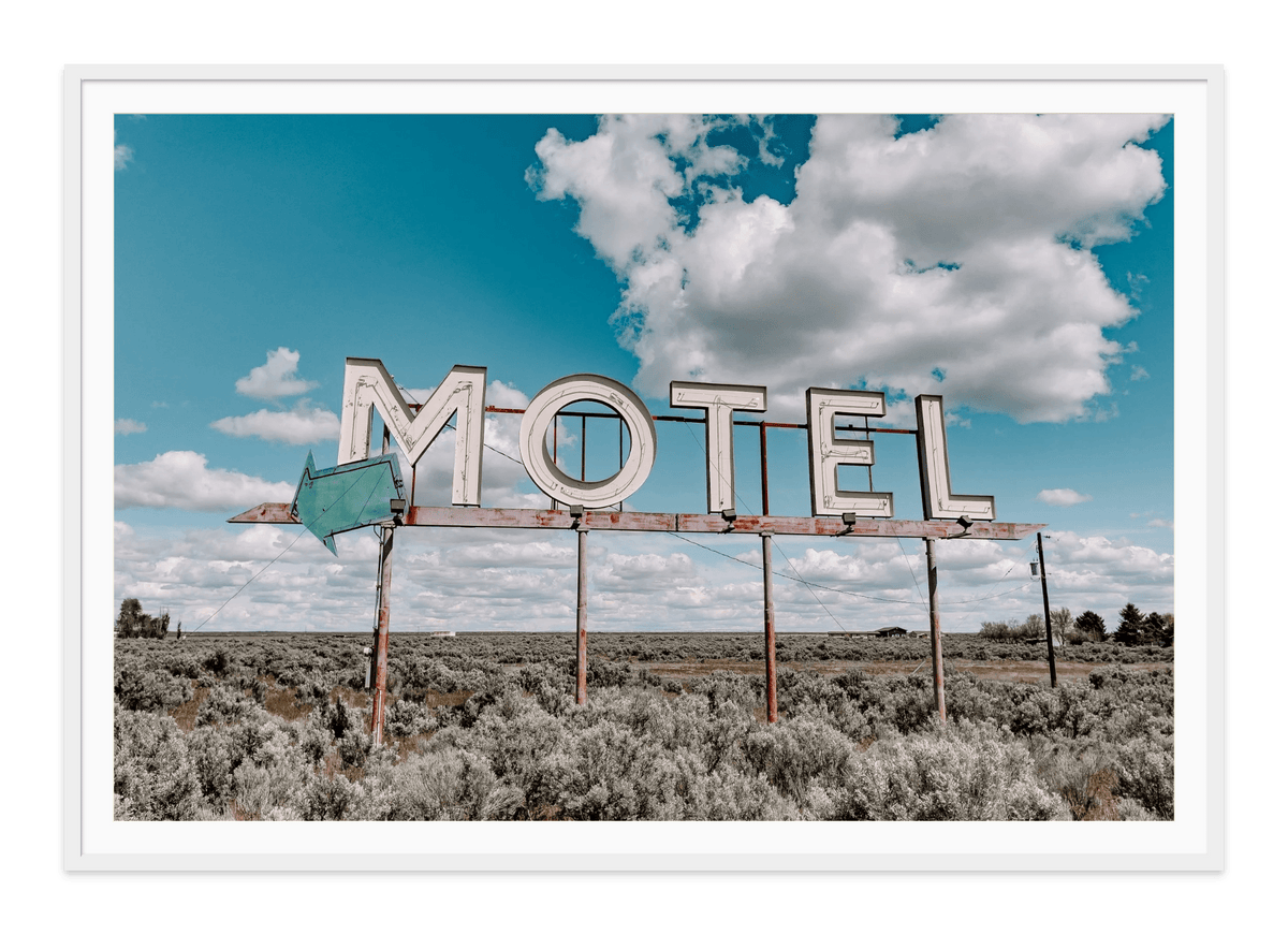 Last Resort fine art print in a white frame with white mat, by Jules Frazier.