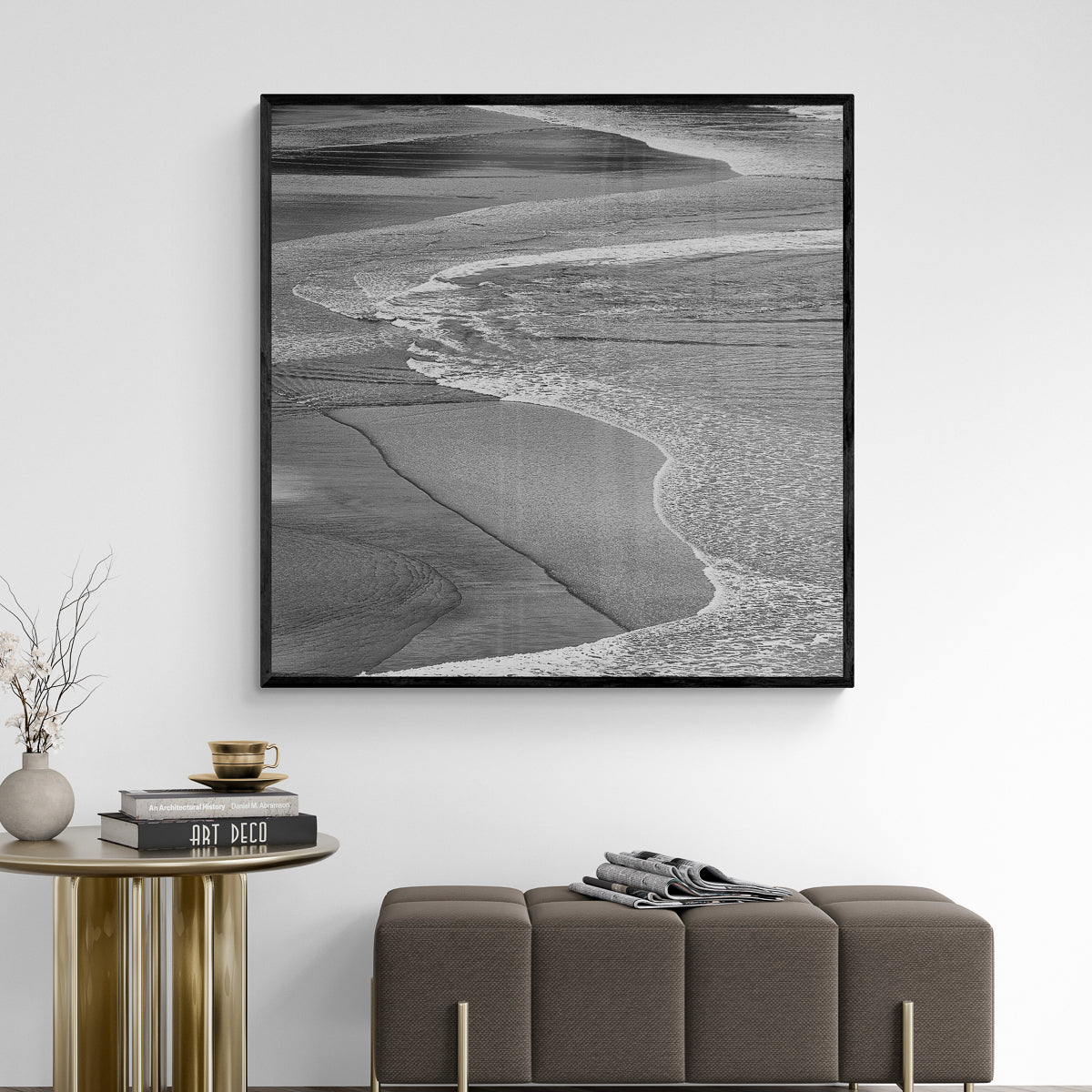Receding Tide fine art print in a black frame above a bench, by Jules Frazier