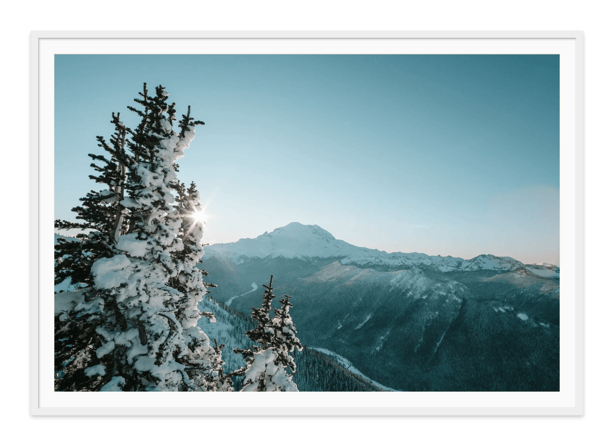 Winter Sunset Over Mount Rainier fine art print in a white frame with white mat, by Jules Frazier.